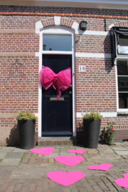 Deurstrik en harten in fuchsia