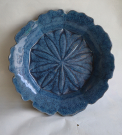 Blauw bord bloemvorm