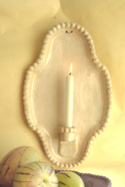 Witte wandkaars met parelrand
