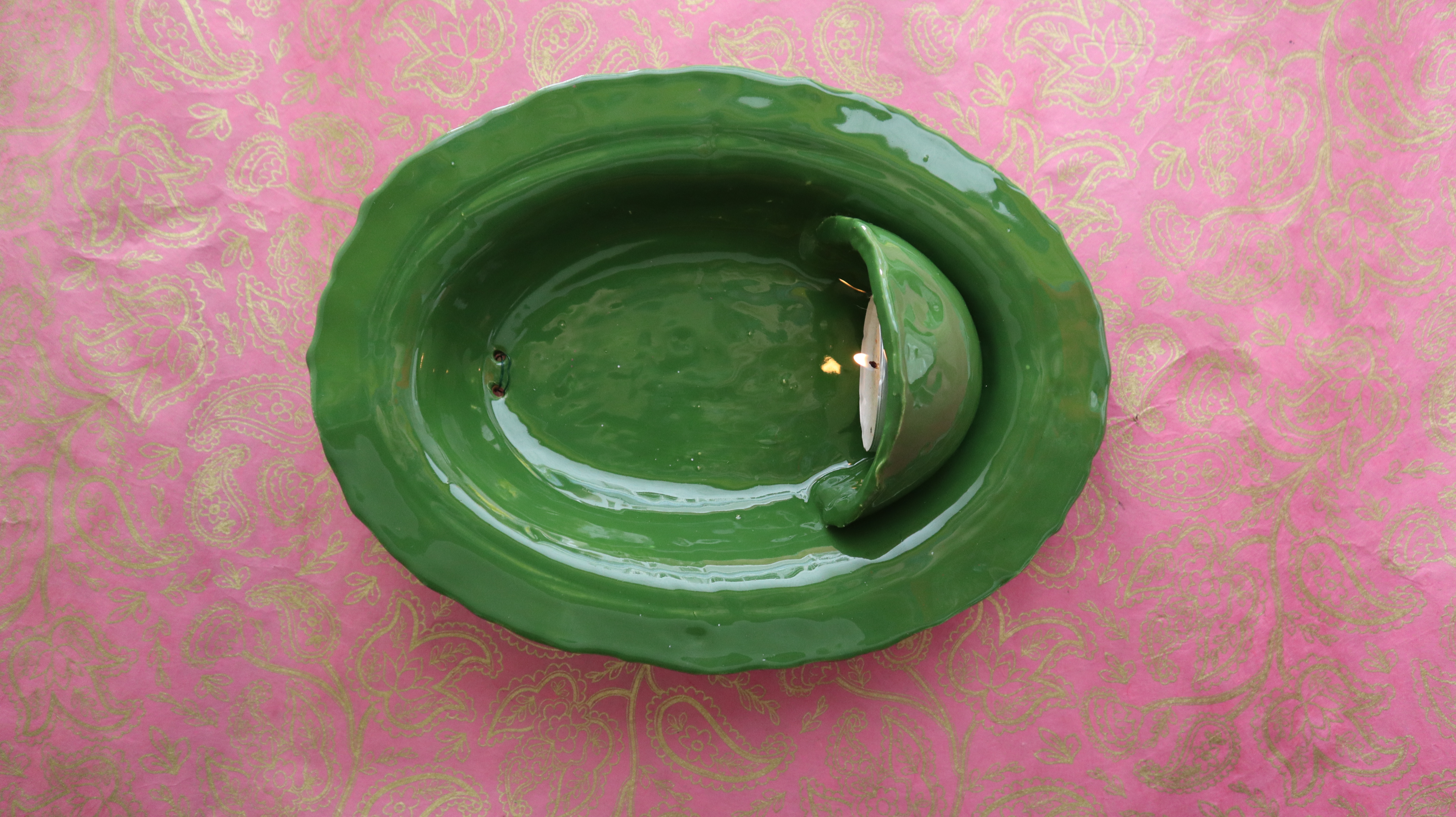 Groen wandbord voor waxine of plantje