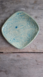 klein blauw bordje