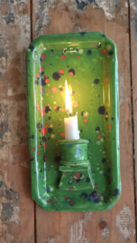 Groene wandkaars met gekleurde spikkels