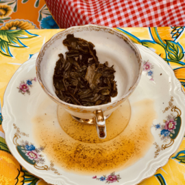 Koffiedik kijken of theeblaadjes lezing