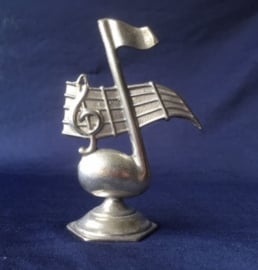 Muziek noot met notenbalk.