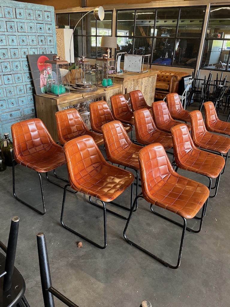 Industriele stoelen metaal met lederen kuip
