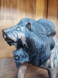 antique wooden lion sculpture