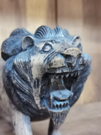 antique wooden lion sculpture