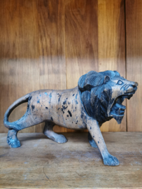 antique wooden lion sculpture