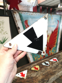 Old triangular enameled arrow sign