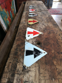 Old triangular enameled arrow sign