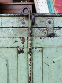 Antique riveted steel cabinet