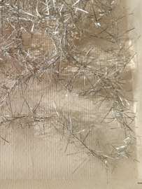 Antieke Tinsel Slinger