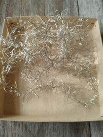 Antieke Tinsel Slinger