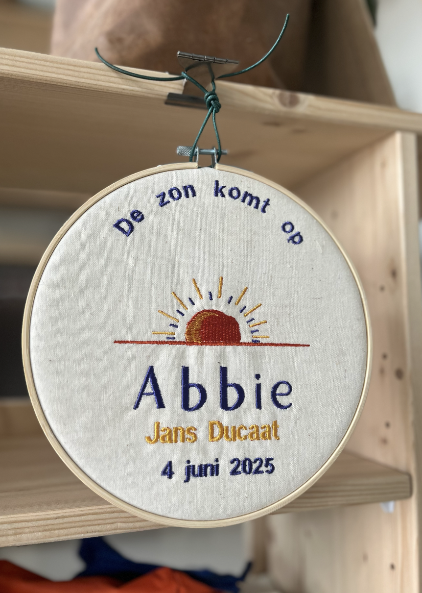 Borduurring van geboortekaartje