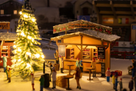 Faller 134006 - 2 Kerstmarktkraampjes met verlichte kerstboom (HO)