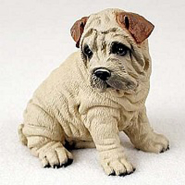 beeldje Sharpei zittend creme