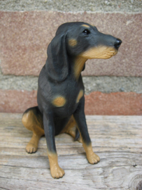 beeldje Coonhound zittend