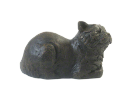 asbeeld/kattenurn Tevreden kat