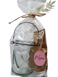 Glazen waxinelichtje met waxkaars