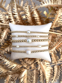 Gold bracelet set with sweet water pearls