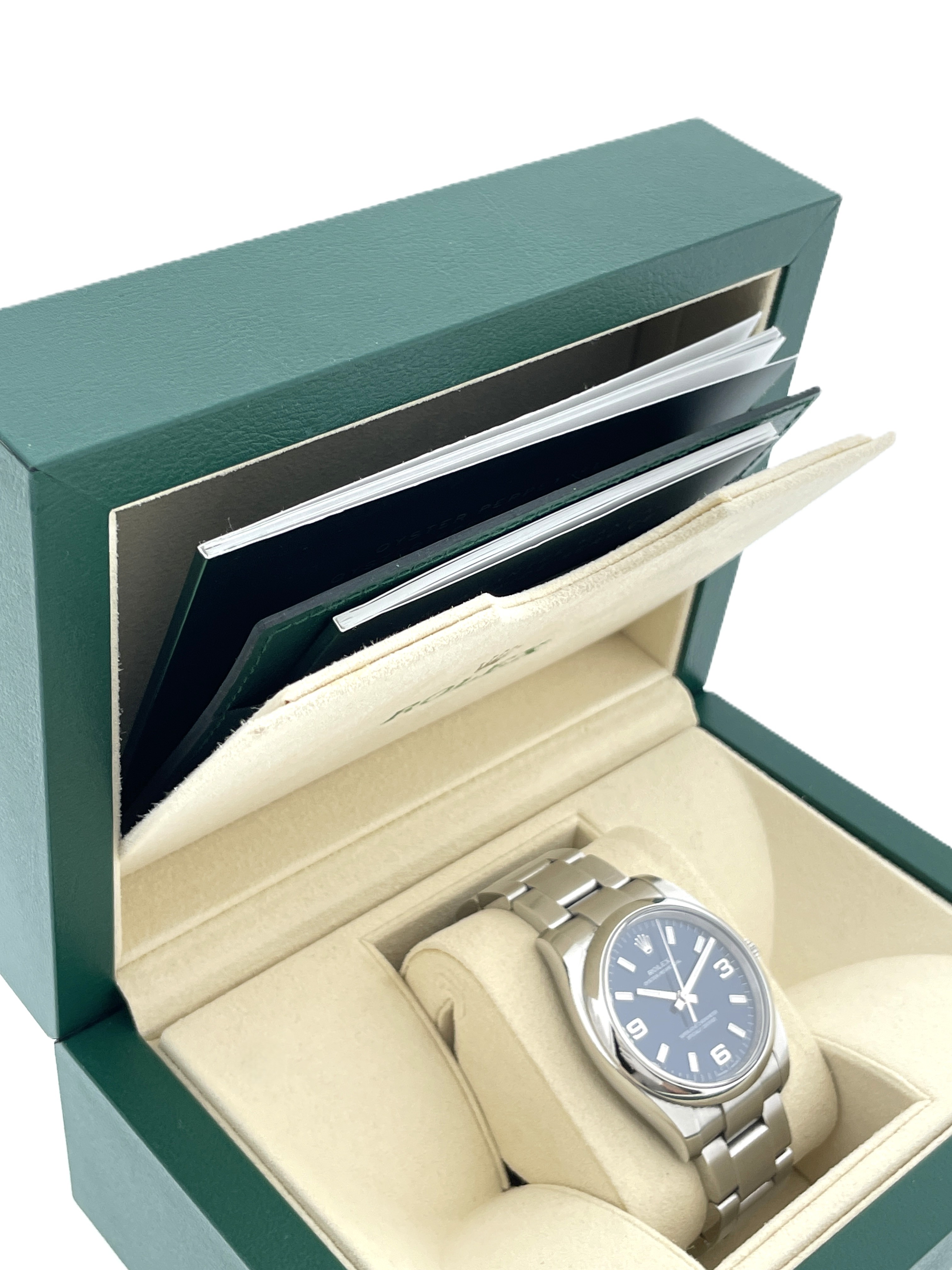 Rolex Oyster Perpetual 114200 Staal Blue Baton Arabic Dial 34 mm - Full set / 2016