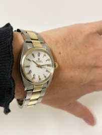 Rolex Oyster Perpetual 6751 White Roman Dial 31 mm - Staal / Goud