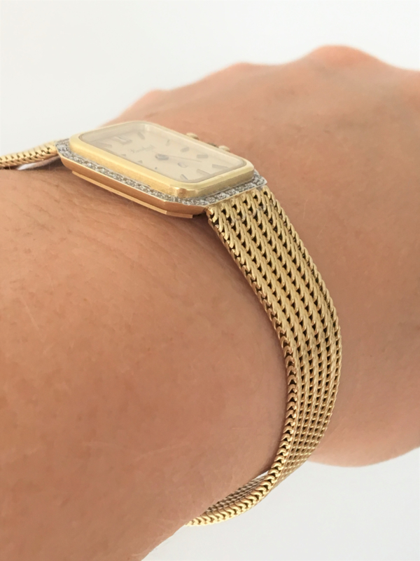 Bouchard 14 K Gouden Dameshorloge 0.32 crt Briljantgeslepen