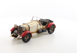 A TIN MODEL OF AN OLDTIMER white