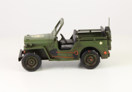 A TIN MODEL OF AN ARMY JEEP