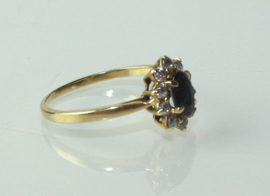 Klassieke gouden ring met saffier en briljant
