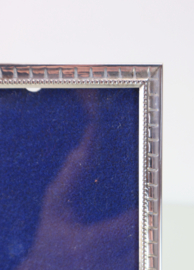 Zilveren fotolijstje, Hooijkaas