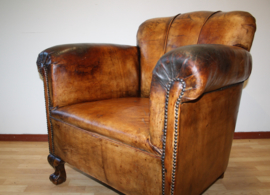 Antieke lederen clubfauteuil