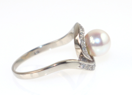 Prachtige witgouden ring met grote parel en 18 diamantjes