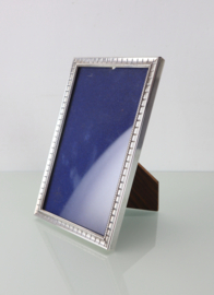 Zilveren fotolijstje, Hooijkaas