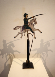 Antieke tuimelaar man te paard