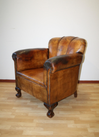 Antieke lederen clubfauteuil
