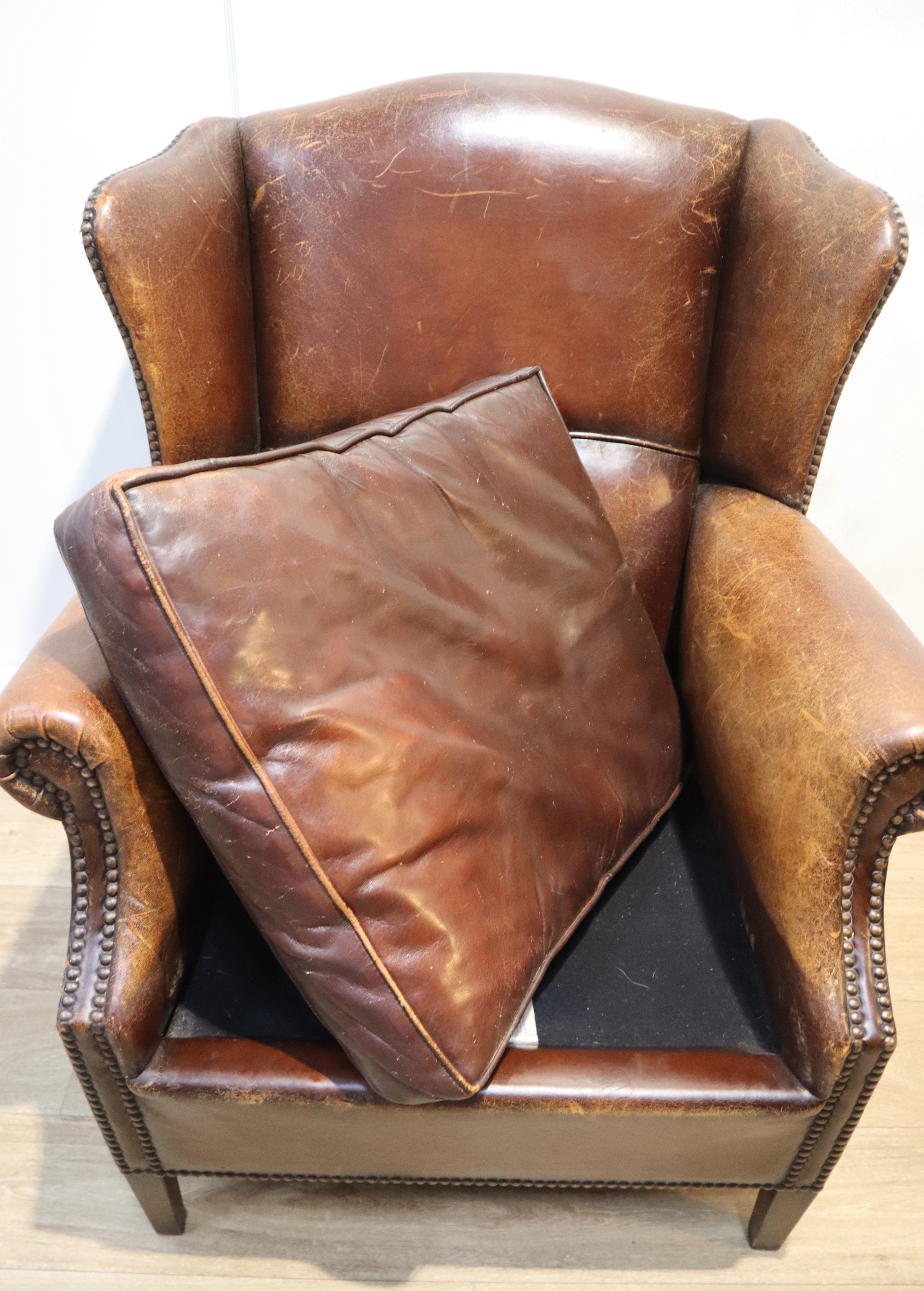 Lederen oorfauteuil, clubfauteuil