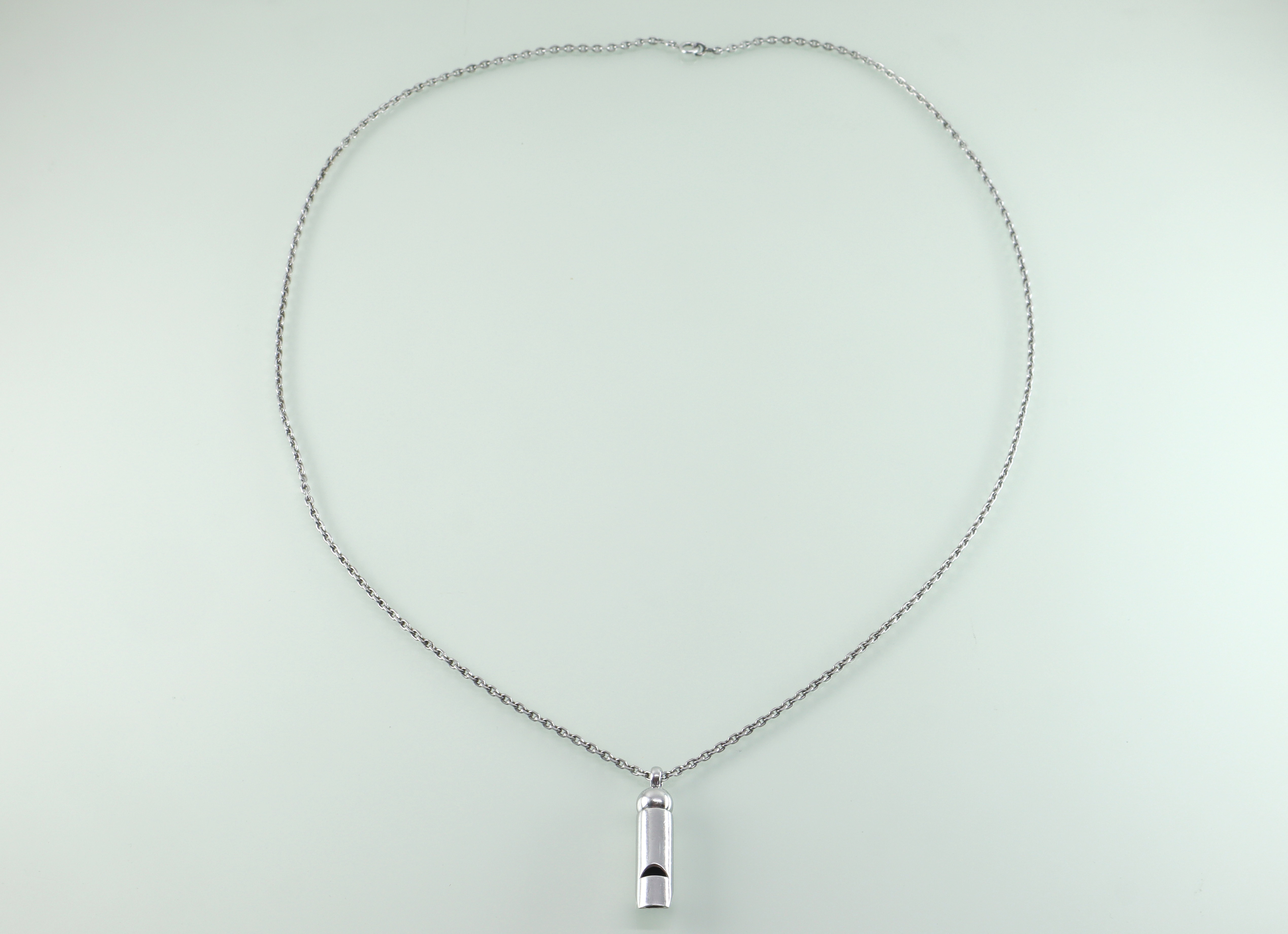 Zilveren echt werkend fluitje aan collier