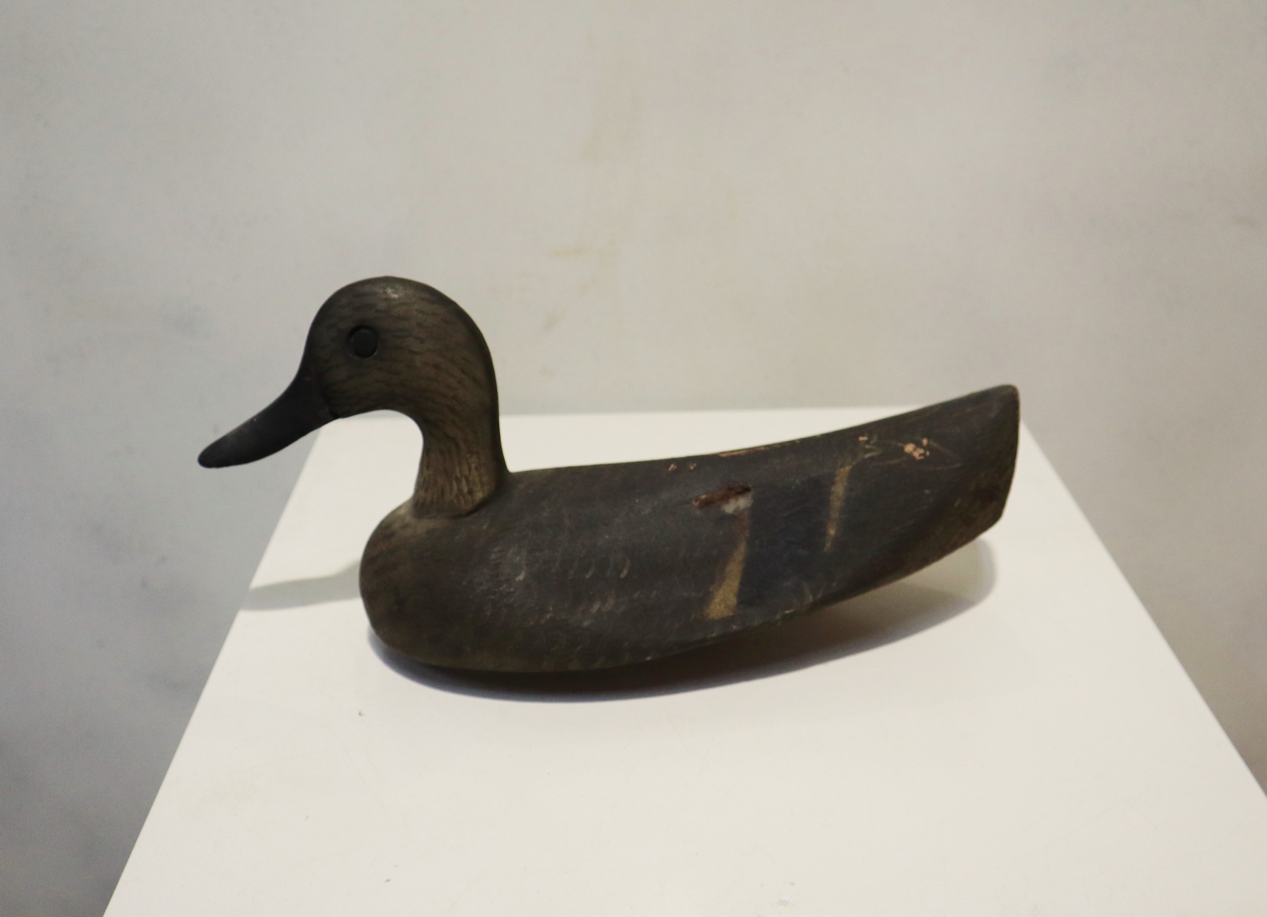 Oude houten lokeend