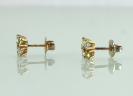 Gouden oorknoppen 18k met peridot en zirkonia