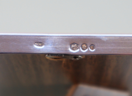 Zilveren fotolijstje, Hooijkaas