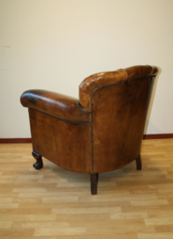 Antieke lederen clubfauteuil