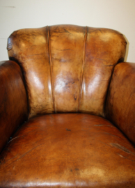 Antieke lederen clubfauteuil