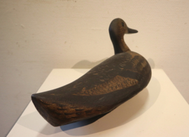 Oude houten lokeend