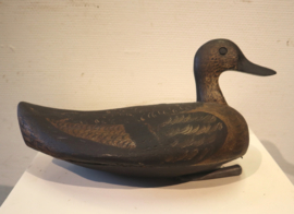Oude houten lokeend