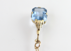 Art Deco gouden hanger blauwe spinel aan collier