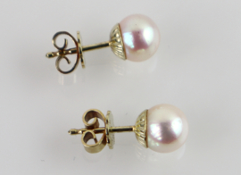 Vintage gouden oorknoppen met zachtroze parel