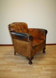Antieke lederen clubfauteuil