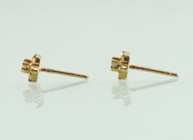 Gouden oorknoppen diamanten bloem
