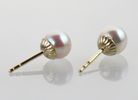 Vintage gouden oorknoppen met zachtroze parel